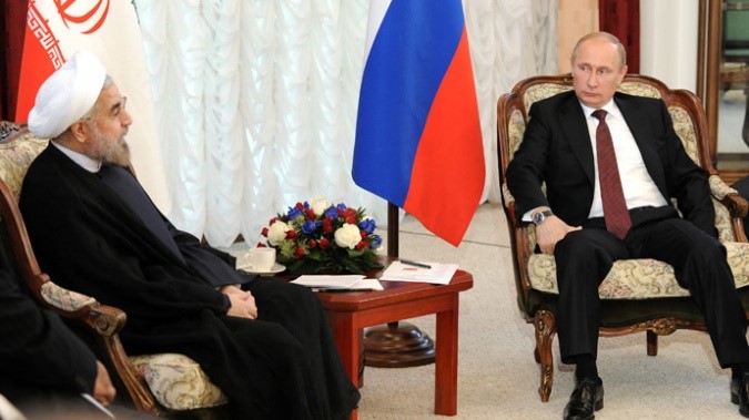 Russian President Vladimir Putin and President of the Islamic Republic of Iran Hassan Rouhani meet during the 2013 SCO summit in Bishkek. (RIA Novosti/Michael Klimentyev)
